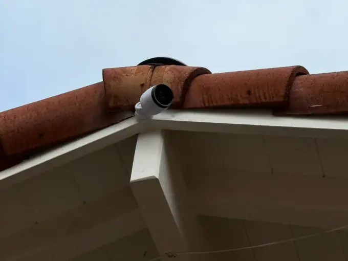 Wall-mounted security camera on a Bay Area home