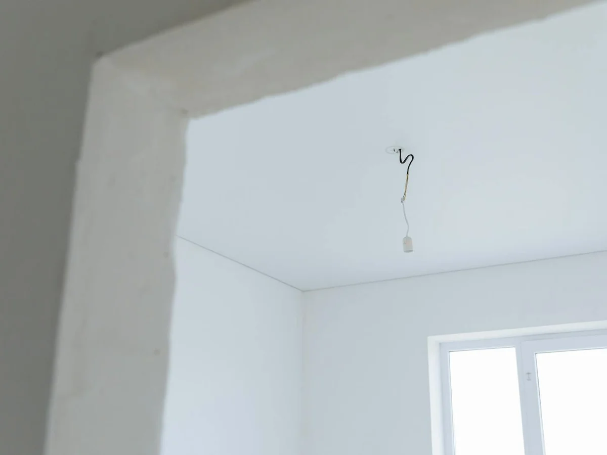 Open interior during construction with electrical rough-in visible